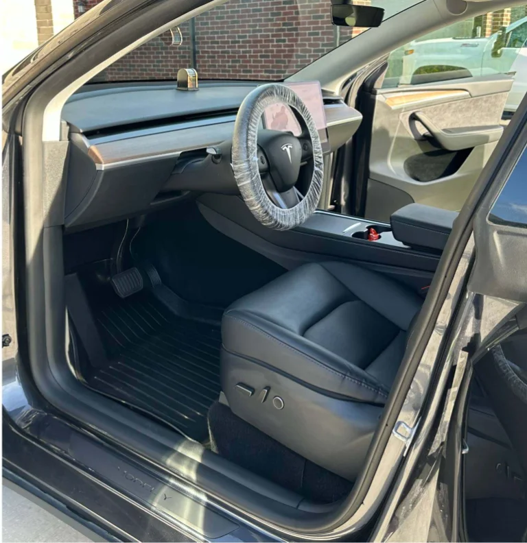After an interior detail: the same Tesla driver's area clean